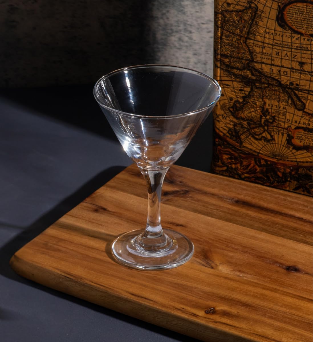 Pair of crystal martini glasses with colorful mocktails on a styled table