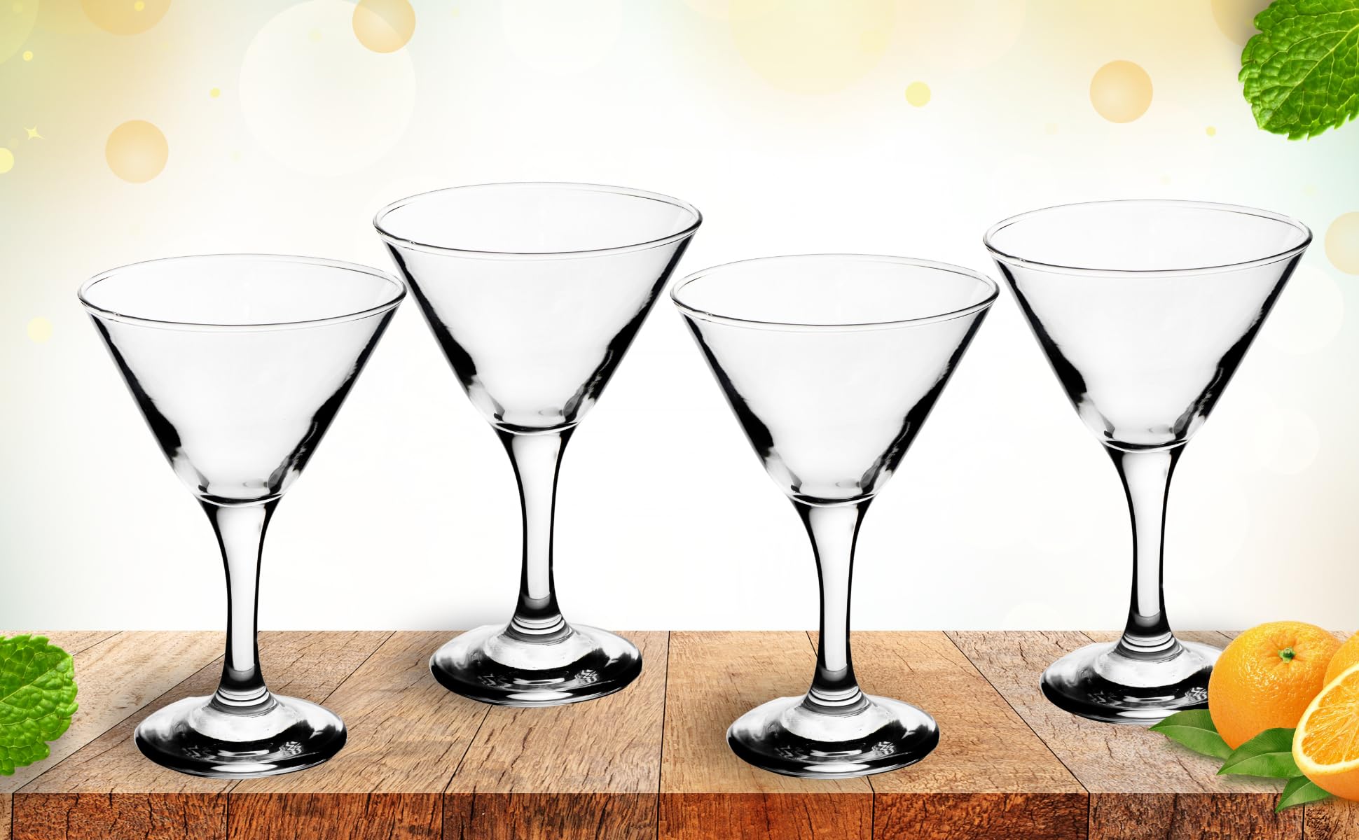Full set of martini glasses arranged together on a polished surface