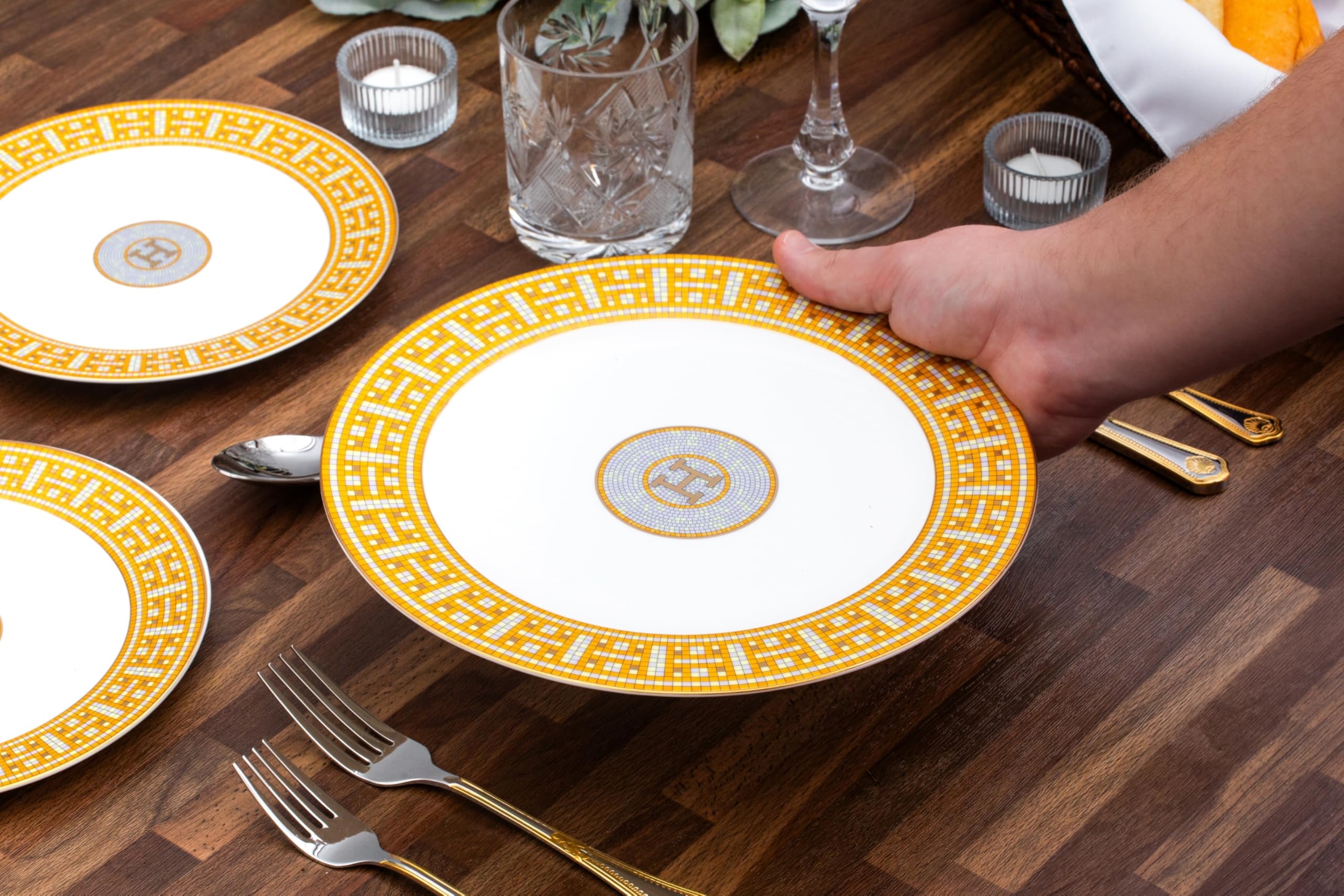 Individual dinner plate from the Royalty Porcelain Mosaic 44-pc set highlighting translucency and gold rim craftsmanship