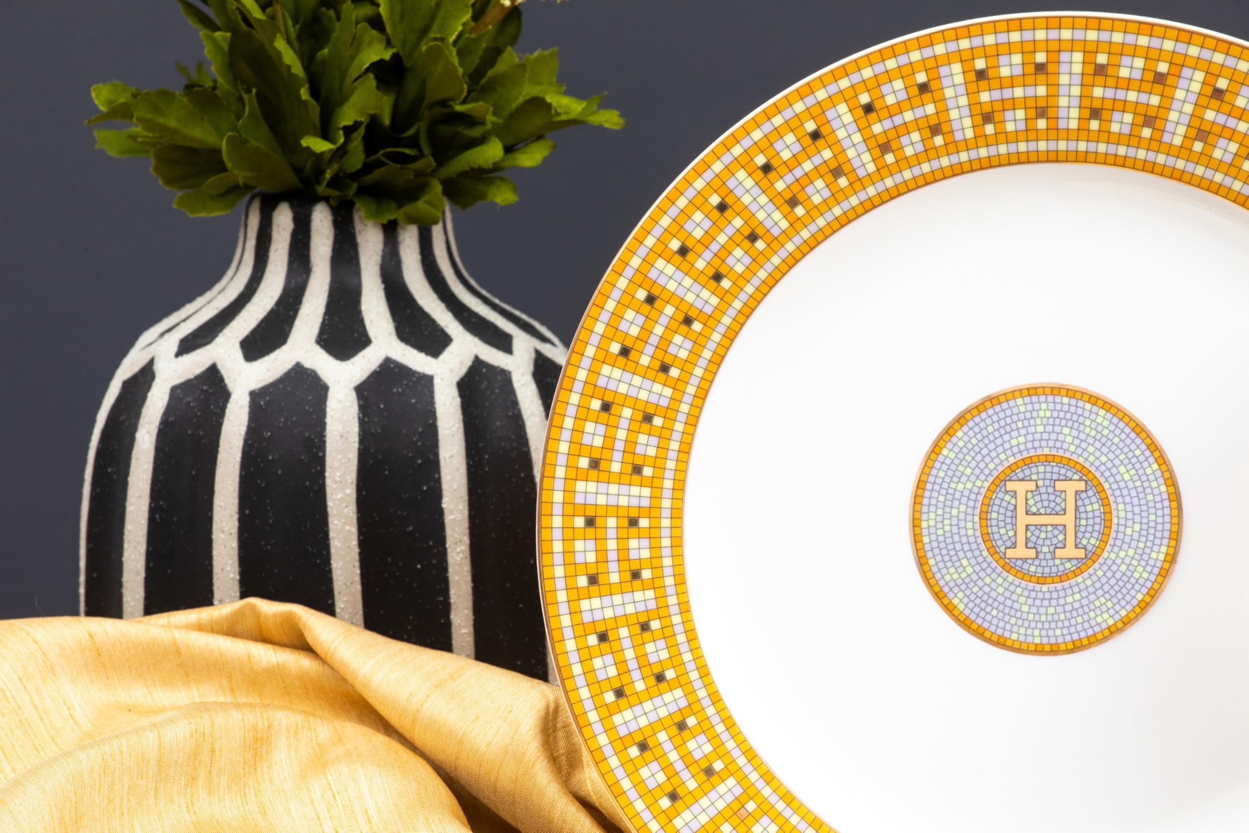 Close-up of intricate mosaic pattern and 24K gold rim on Royalty Porcelain bone china dinner plate