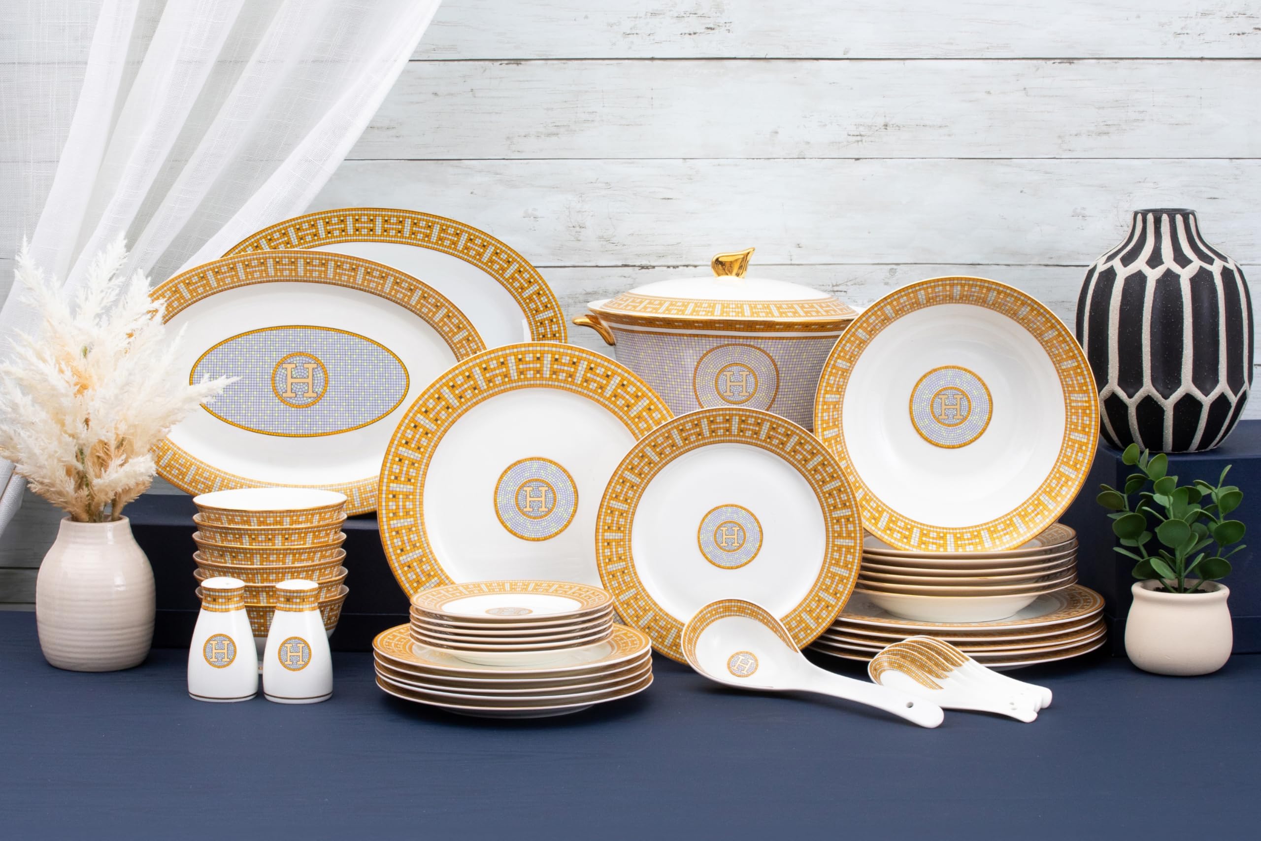 Royalty Porcelain 58-pc Mosaic dinner set displayed as a decorative collection in a glass cabinet