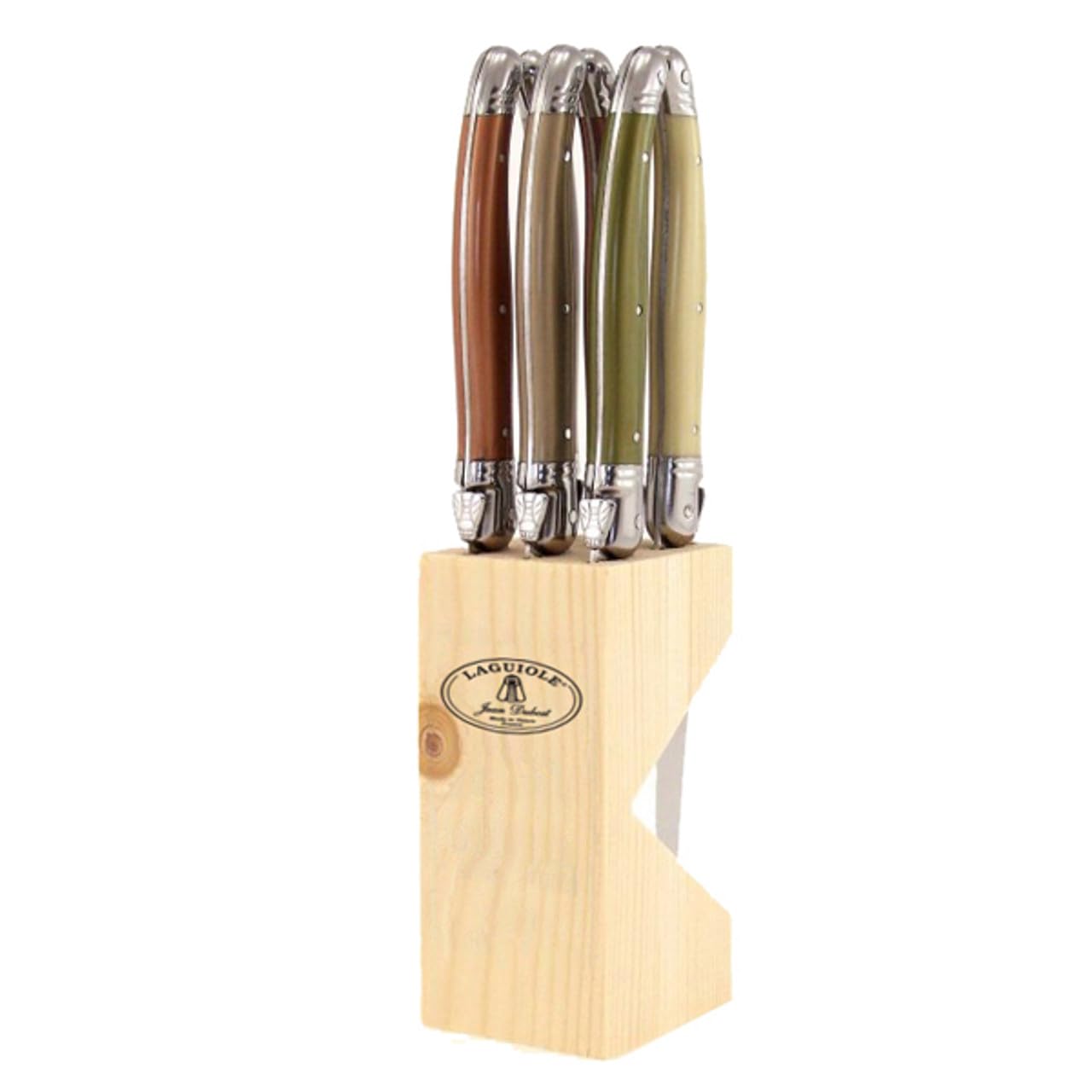Laguiole steak knife placed beside a dinner plate to show blade length and scale