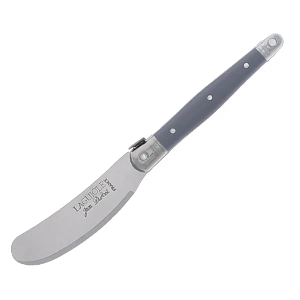 Gifts Plaza spreader knife set arranged around a small ceramic butter dish at a table setting