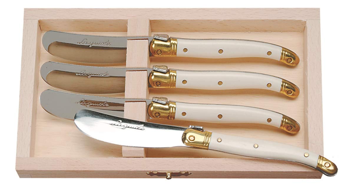 4-piece cheese spreader set presented as a gift with tray, showcasing all four handle colors