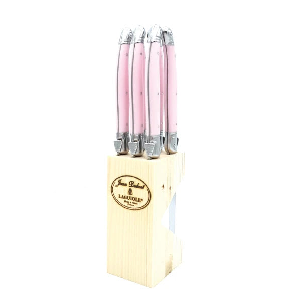 Top-down view of Laguiole steak knives in wooden block showing slot arrangement