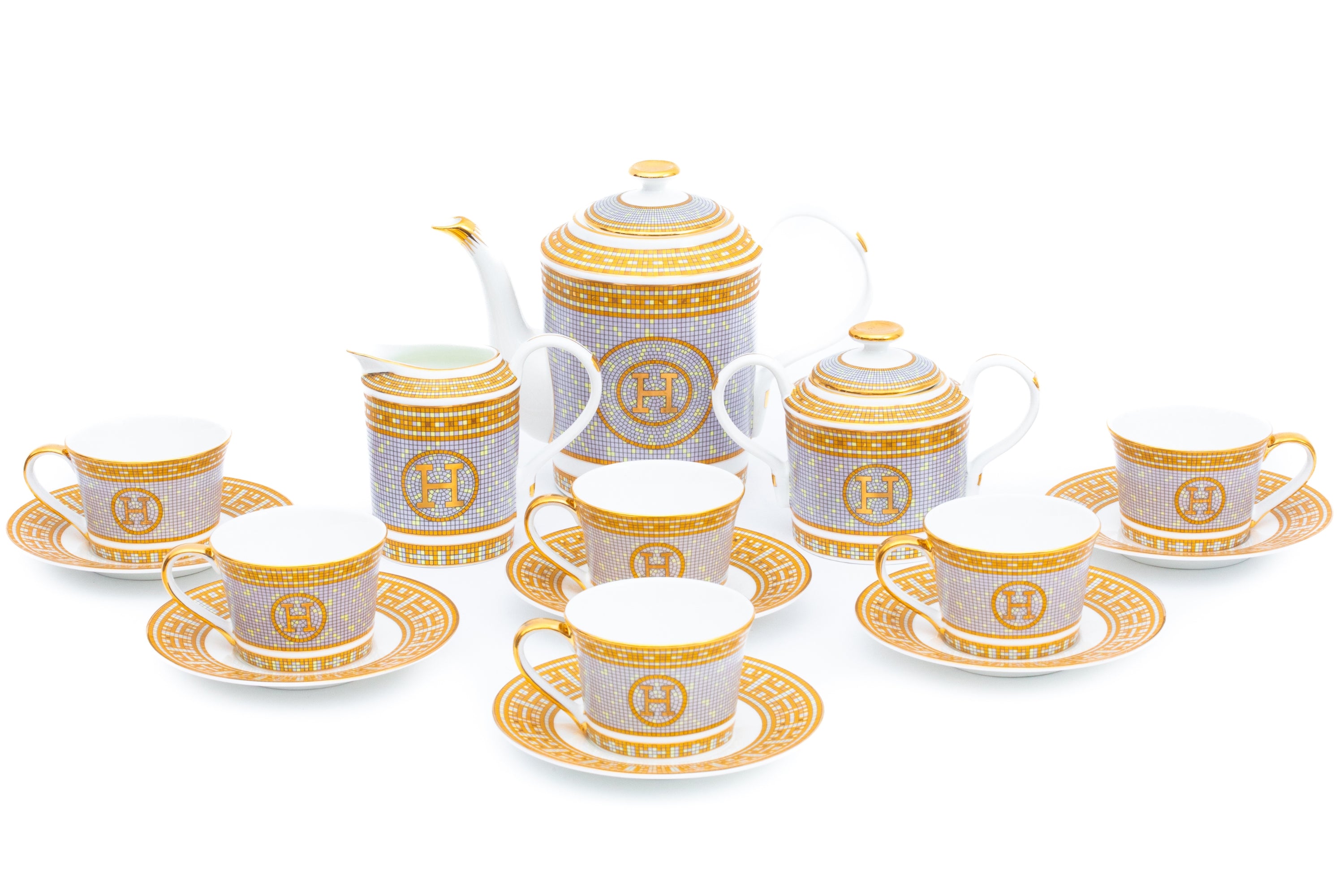 Tea set saucers cups tea pot sugar pot creamer