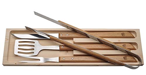 Jean Dubost Laguiole handmade 4-piece BBQ set with warm oak handles displayed on a rustic wooden surface